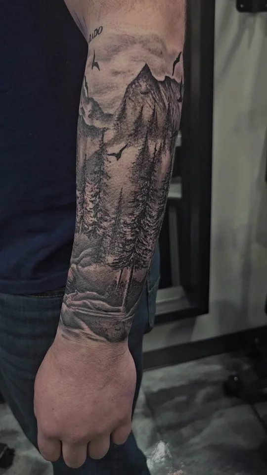 12 hour forearm wrap tattoo session black and grey by Alex Zamora