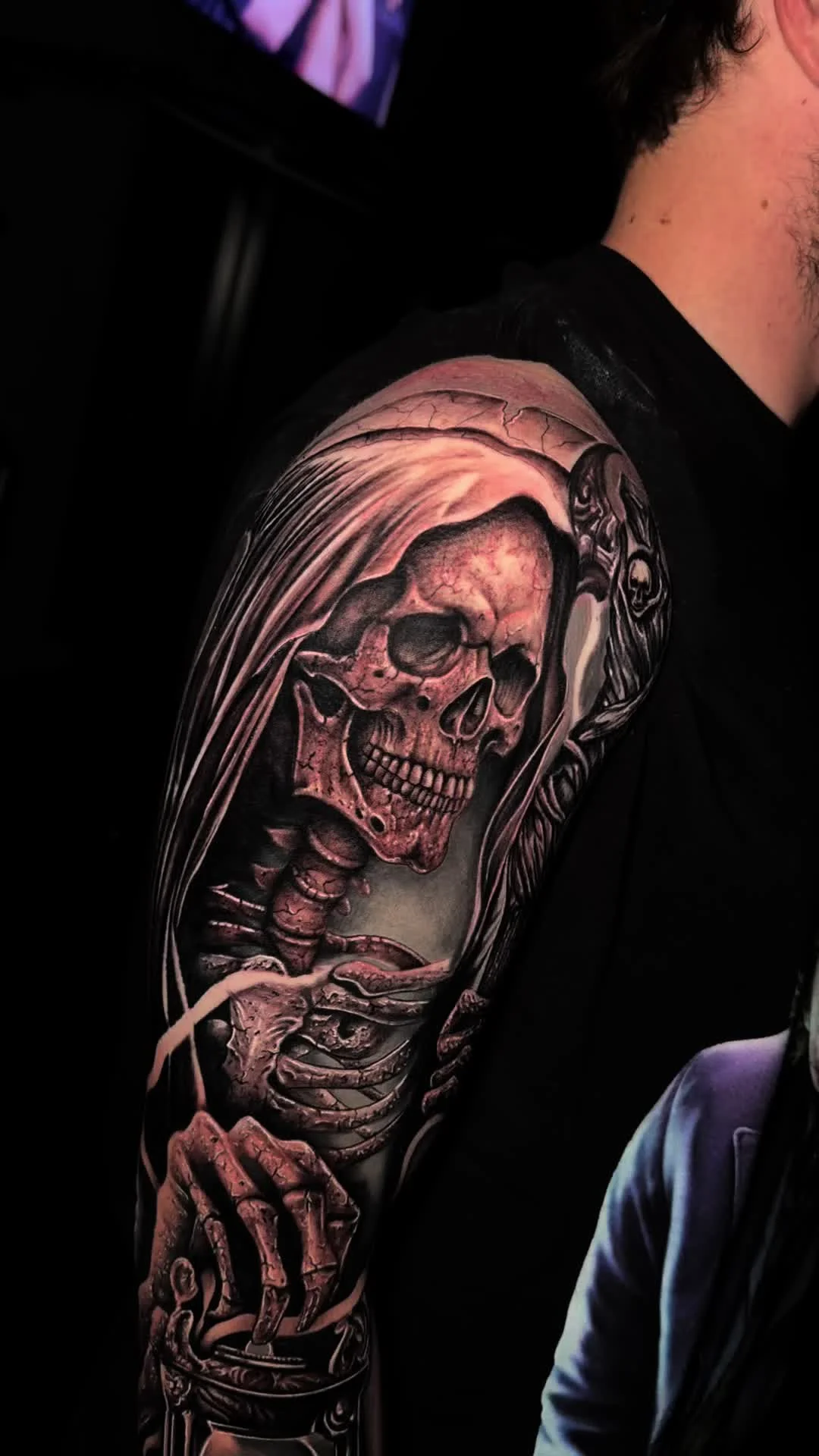 Grim Reaper skeleton hooded tattoo on upper arm by Alex Zamora